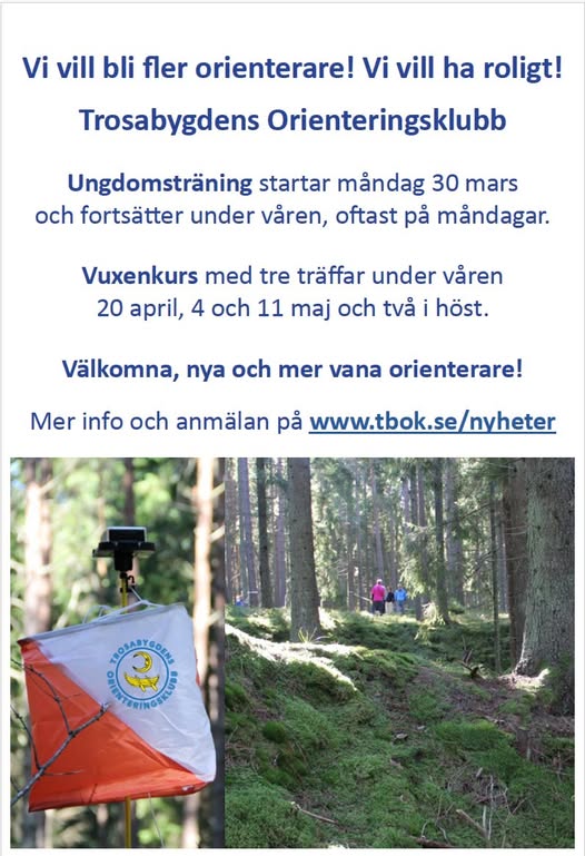 Orange/vit skärm på träd.